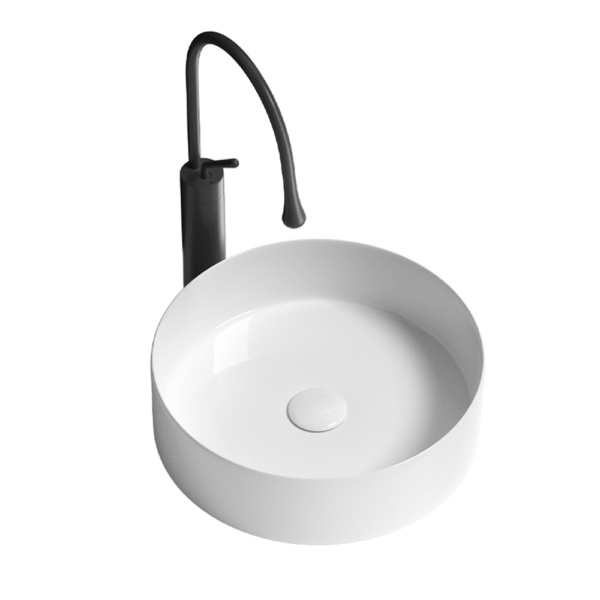 The sink in the minimalist bathroom is a round ceramic washbasin